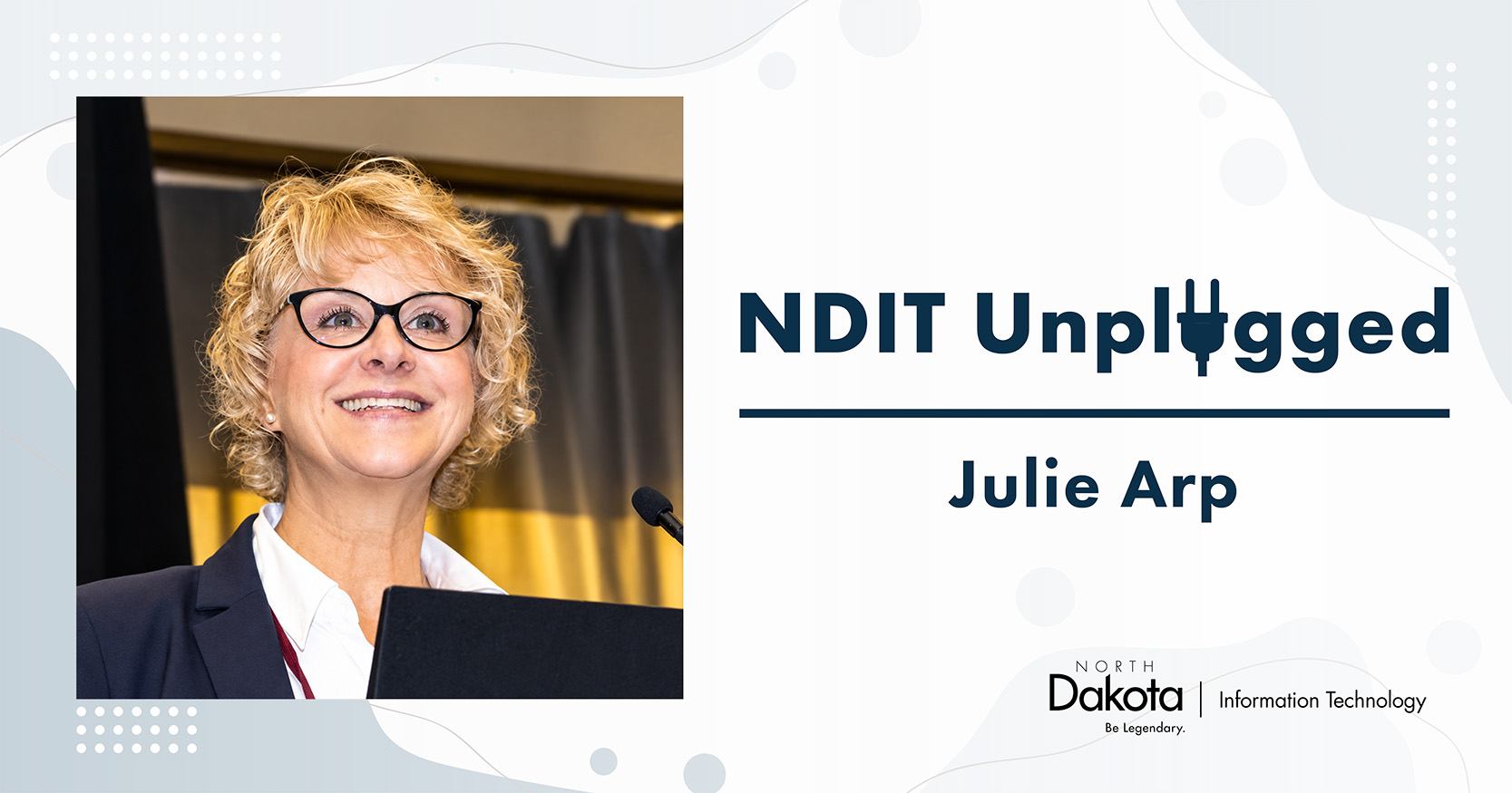 Julie Arp’s professional headshot placed in a light-colored NDIT Unplugged graphic that shows her name and NDIT’s logo.
