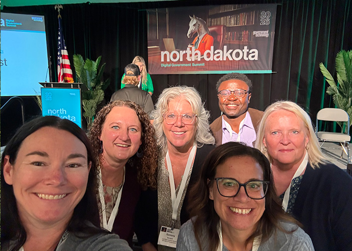 While attending a conference, an NDIT Technology Business Partner takes a selfie with friends from a state agency we serve.