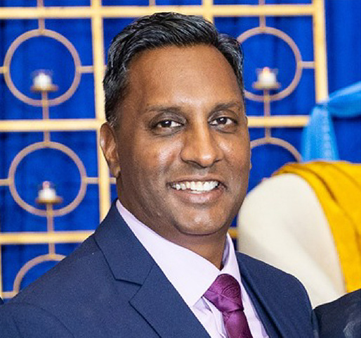 A professional headshot of Ravi Shivdat, NDIT Privacy Officer.